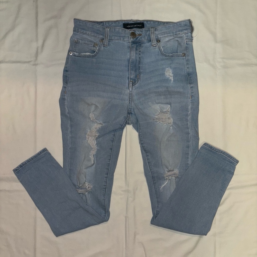 Ripped light blue skinny jeans